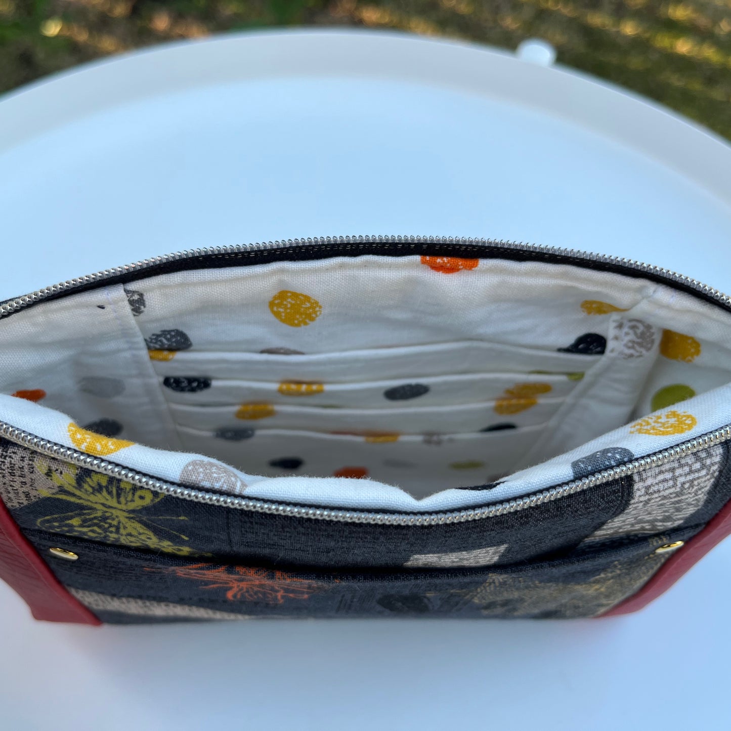 Norfolk Pouch - Filigree Newsprint w/ red