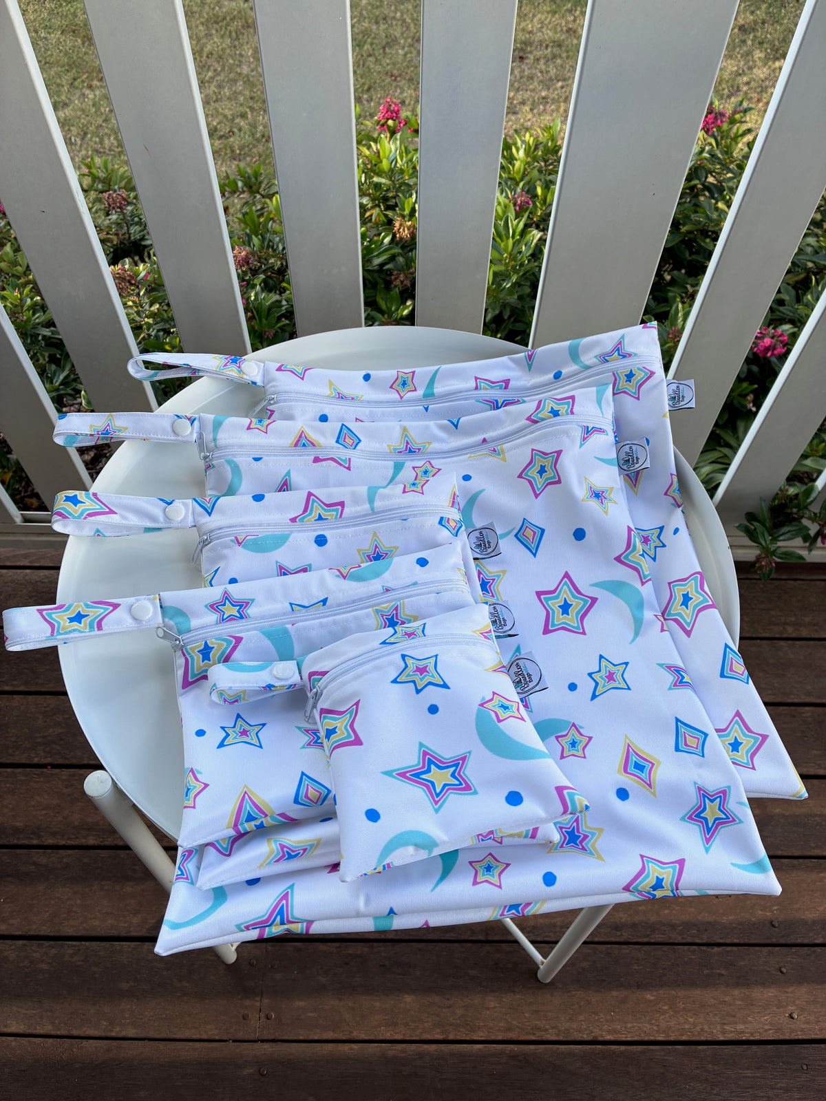 Water-resistant wet bags - Psychedelic Retro Stars and Moons Rainbow on White (JacSlade)